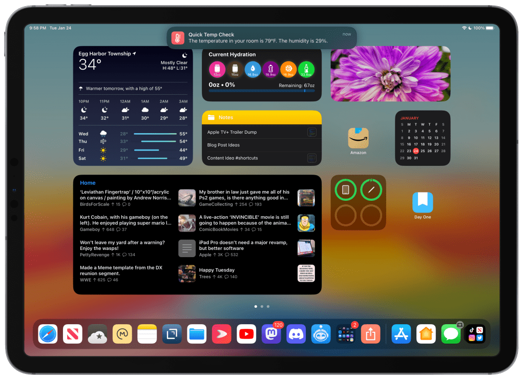 An iPad Pro Home Screen showing the Quick Temp Notification as a banner at the top of the screen. 